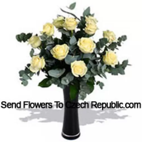 11 White Roses With Some Ferns In A Vase